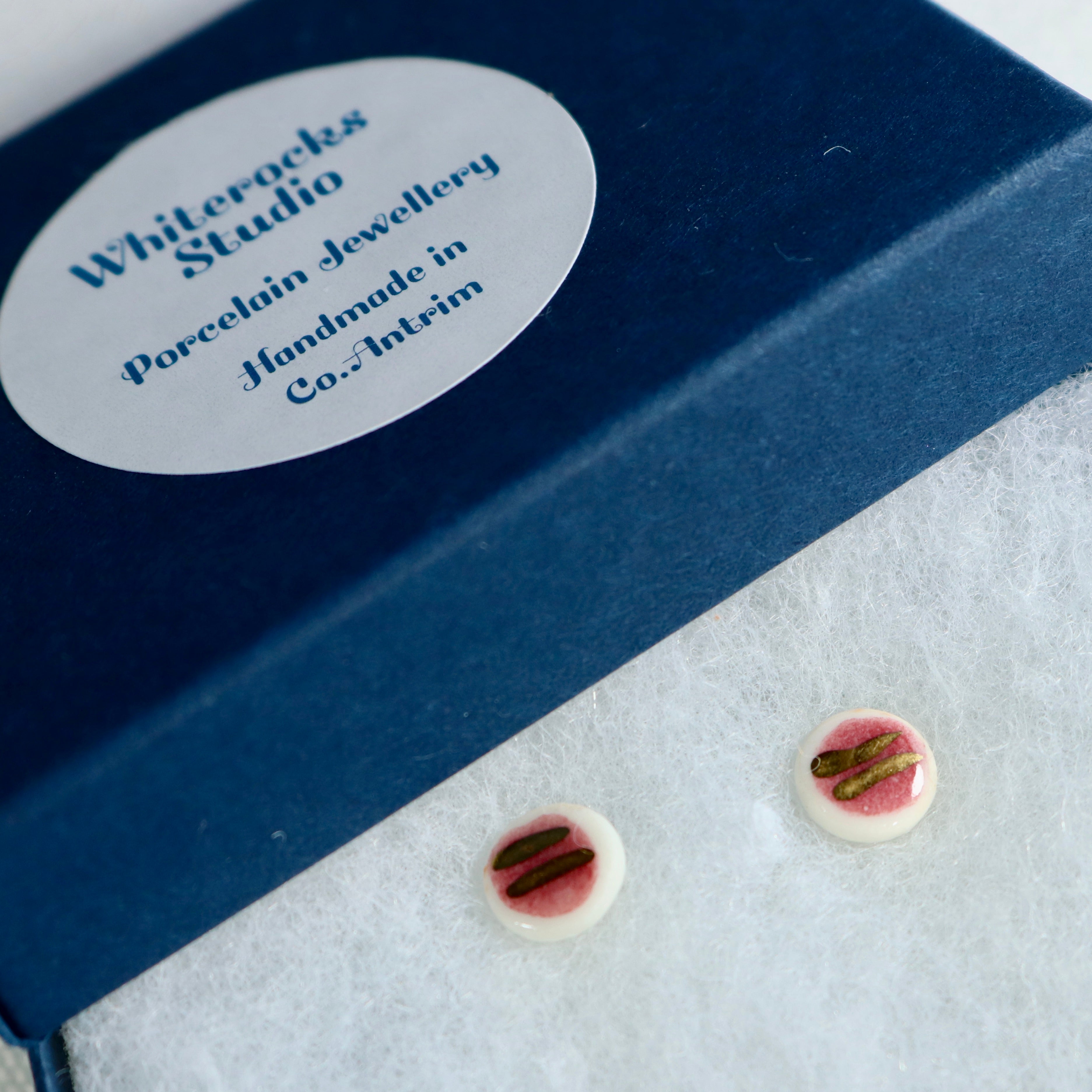 Dark pink and gold earrings