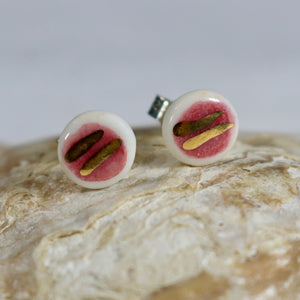 Dark pink and gold earrings